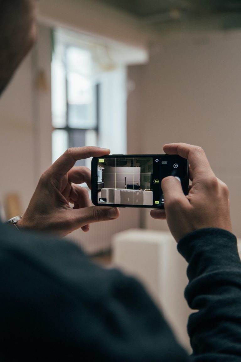 a person holding a camera