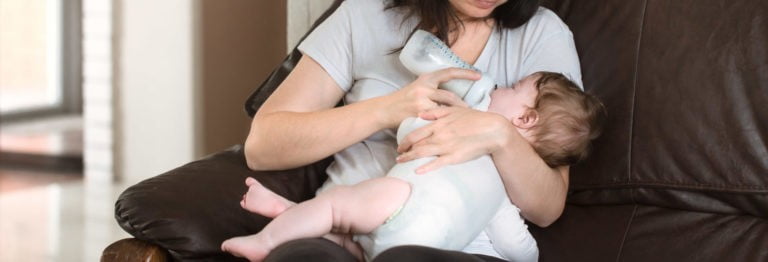 a person holding a baby