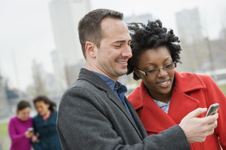 a man looking at his phone