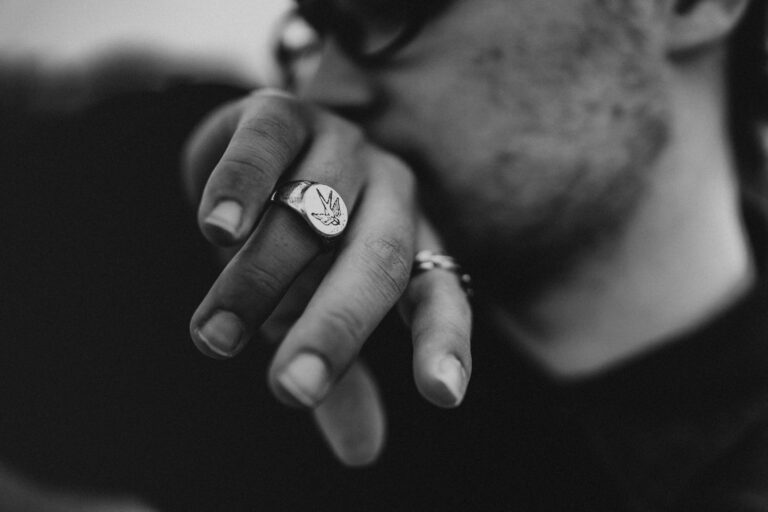 a person holding a cigarette
