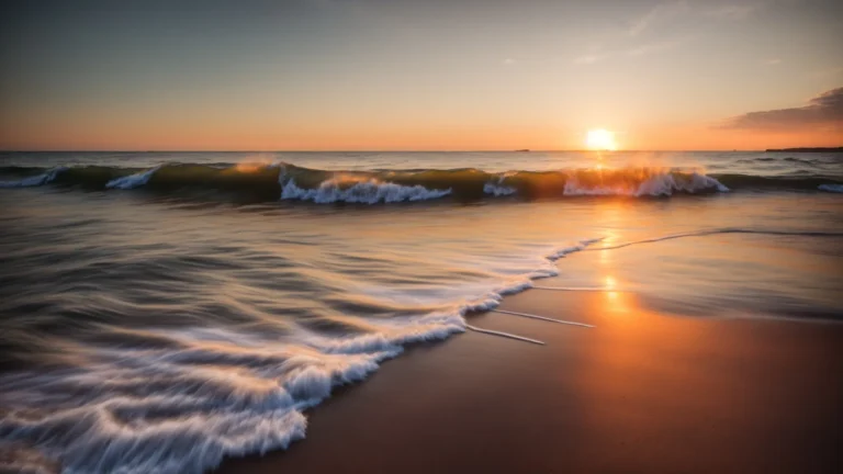 a serene beach at sunset, with calming waves gently caressing the shore.